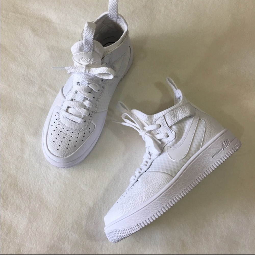 Nike Air Force ones. Practically new.